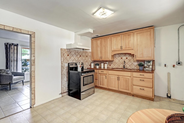 9418 Cordova Ave NE, Albuquerque, NM 87112 - kitchen featuring stainless steel electric stove, light brown cabinetry, custom exhaust hood, and backsplash