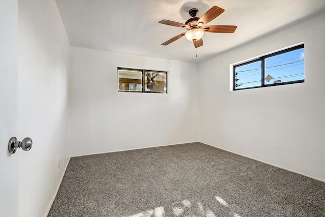 9418 Cordova Ave NE, Albuquerque, NM 87112 - carpeted empty room with a ceiling fan
