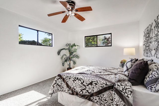 9418 Cordova Ave NE, Albuquerque, NM 87112 - bedroom featuring carpet floors and a ceiling fan