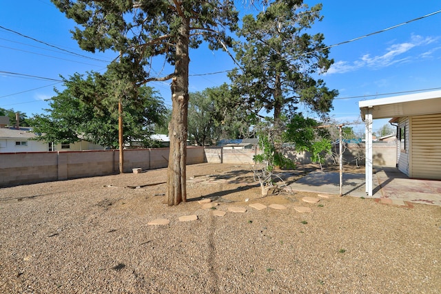 9418 Cordova Ave NE, Albuquerque, NM 87112 - fenced backyard with a patio