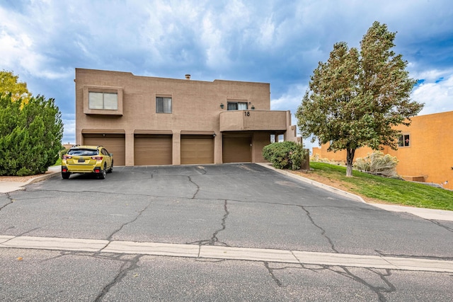 2900 Vista Del Rey NE Unit 18D, Albuquerque, NM 87112 - adobe home featuring stucco siding