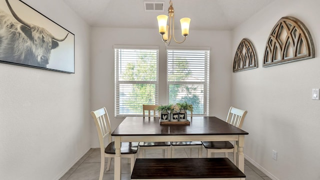2404 Del Timbre Ln SW, Albuquerque, NM 87121 - dining area with a chandelier and light tile patterned floors