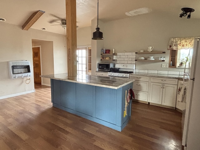 2 Bus Ln, Sandia Park, NM 87047 - kitchen with heating unit, white appliances, dark wood-style floors, blue cabinets, and vaulted ceiling