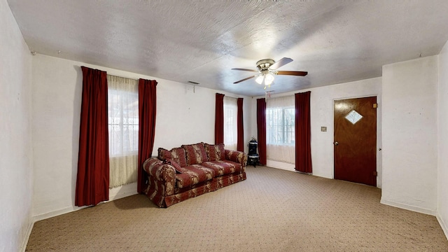 604 9th St SW, Albuquerque, NM 87102 - sitting room featuring carpet flooring and a ceiling fan