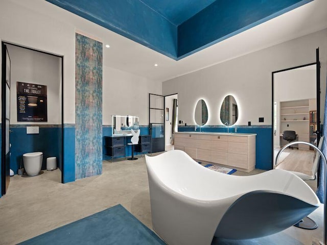 400 Perea Ln, Corrales, NM 87048 - full bathroom featuring vanity, a freestanding bath, and concrete flooring