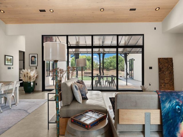 400 Perea Ln, Corrales, NM 87048 - living room featuring wooden ceiling, concrete floors, and recessed lighting