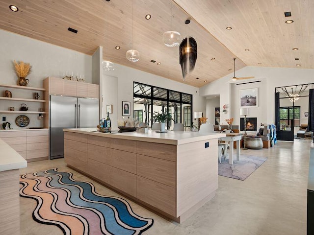 400 Perea Ln, Corrales, NM 87048 - kitchen with modern cabinets, wooden ceiling, stainless steel built in refrigerator, a large island, and light countertops