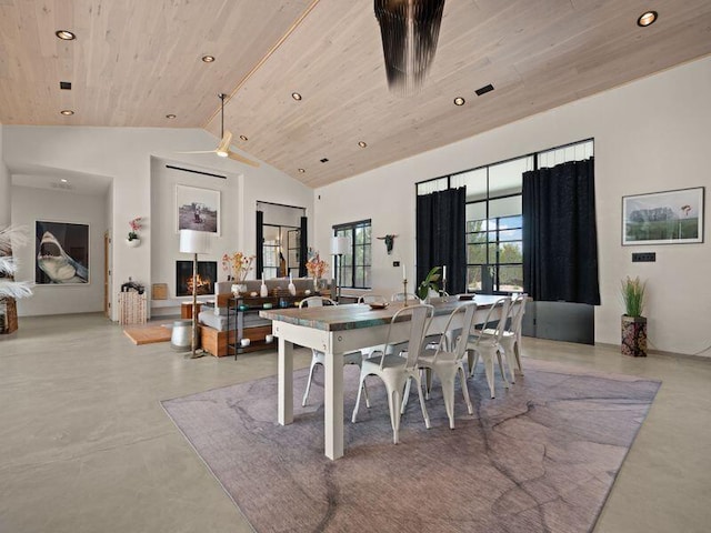 400 Perea Ln, Corrales, NM 87048 - dining area with wood ceiling, concrete floors, lofted ceiling, and recessed lighting