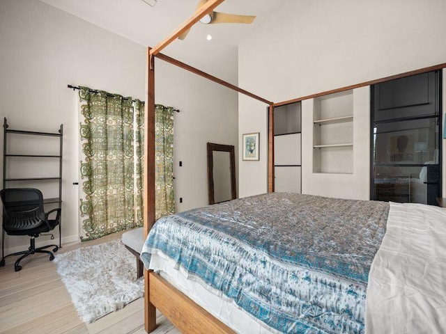 400 Perea Ln, Corrales, NM 87048 - bedroom featuring wood finished floors and a high ceiling