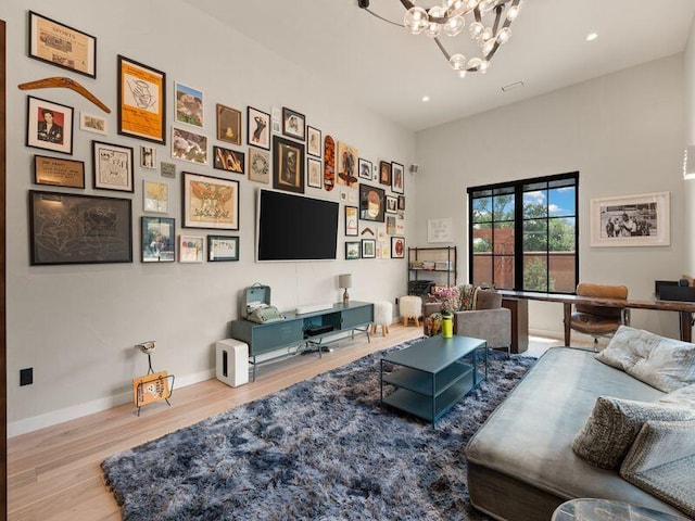400 Perea Ln, Corrales, NM 87048 - living room featuring wood finished floors, a chandelier, and recessed lighting