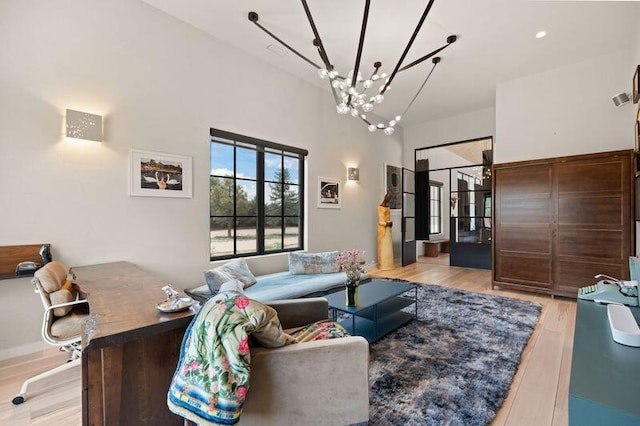 400 Perea Ln, Corrales, NM 87048 - living area featuring light wood-type flooring and a chandelier