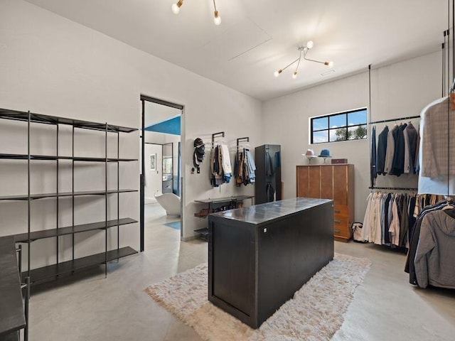 400 Perea Ln, Corrales, NM 87048 - spacious closet featuring a chandelier