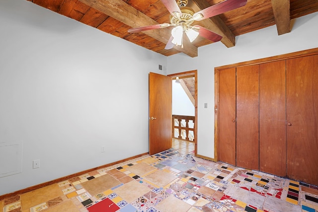 118 Sandia View Rd, Corrales, NM 87048 - unfurnished bedroom with a wood ceiling with exposed beams, a closet, and ceiling fan