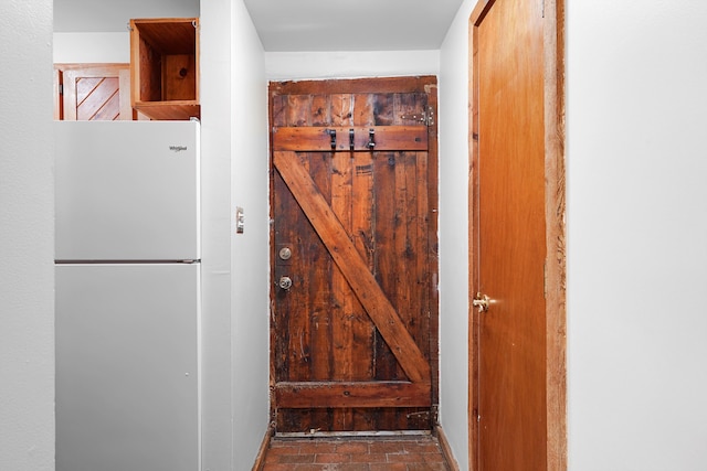 118 Sandia View Rd, Corrales, NM 87048 - detailed view of freestanding refrigerator and baseboards