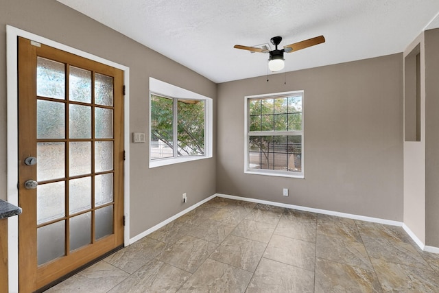 1519 Lundy Ln SW, Albuquerque, NM 87105 - empty room with baseboards and ceiling fan