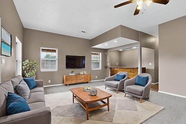 1519 Lundy Ln SW, Albuquerque, NM 87105 - living area with carpet floors and a ceiling fan