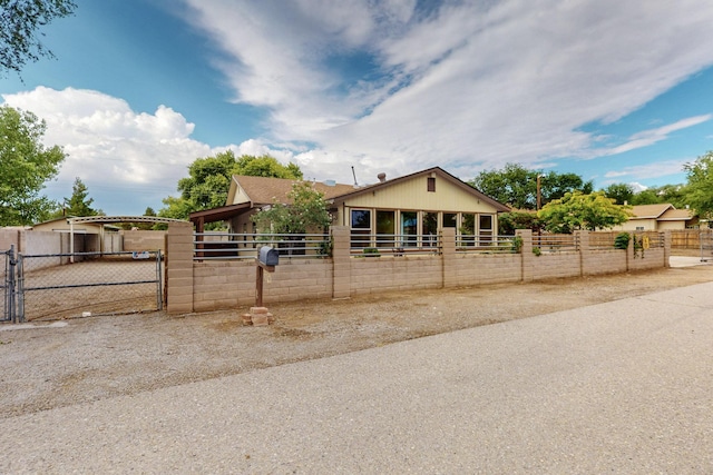 1519 Lundy Ln SW, Albuquerque, NM 87105 - view of front facade featuring a gate