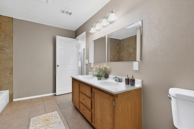 1519 Lundy Ln SW, Albuquerque, NM 87105 - bathroom with double vanity, tile patterned floors, and a tub to relax in
