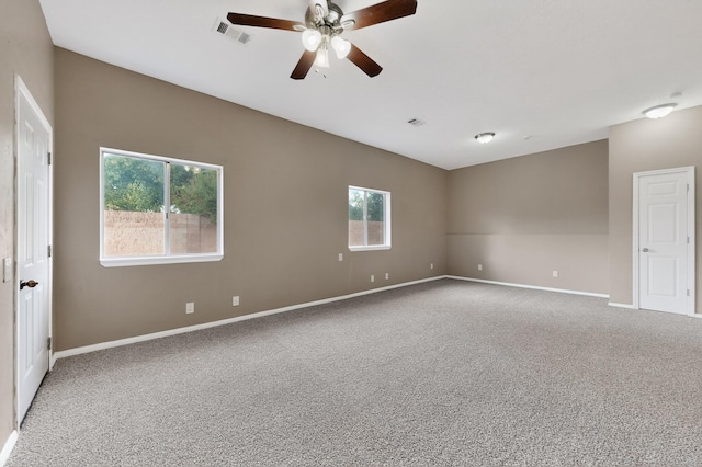 1519 Lundy Ln SW, Albuquerque, NM 87105 - carpeted empty room featuring baseboards and ceiling fan