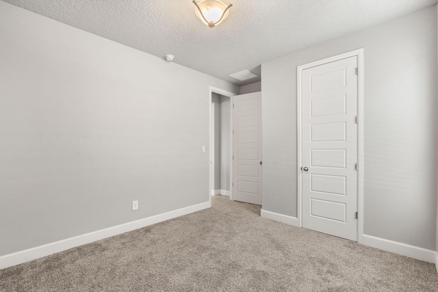 2520 Guadalupe Rd NE, Rio Rancho, NM 87144 - unfurnished bedroom featuring carpet floors and a textured ceiling