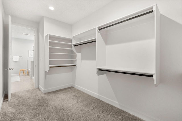 2520 Guadalupe Rd NE, Rio Rancho, NM 87144 - walk in closet with carpet flooring