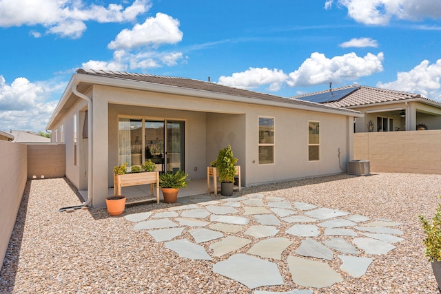 2520 Guadalupe Rd NE, Rio Rancho, NM 87144 - rear view of house featuring stucco siding, a patio area, a fenced backyard, and a tiled roof
