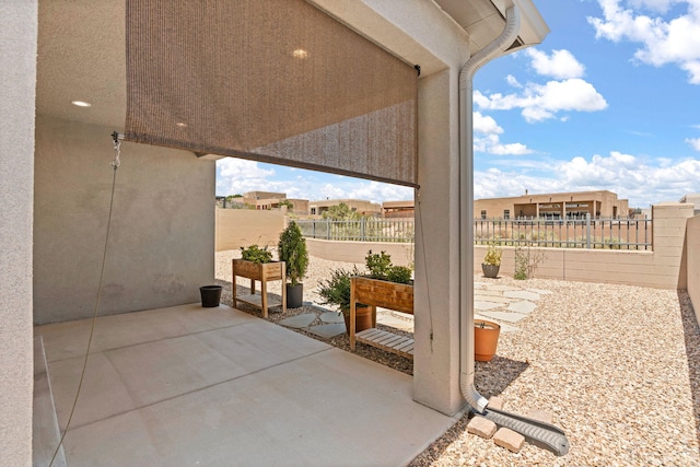 2520 Guadalupe Rd NE, Rio Rancho, NM 87144 - fenced backyard with a patio