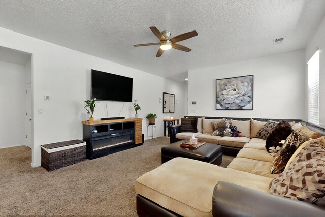 2332 Del Timbre Ln SW, Albuquerque, NM 87121 - living room with ceiling fan, carpet floors, and a textured ceiling
