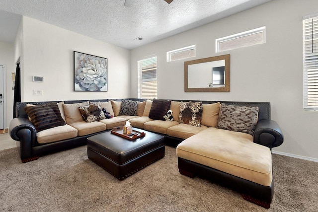 2332 Del Timbre Ln SW, Albuquerque, NM 87121 - carpeted living room featuring a textured ceiling and a ceiling fan