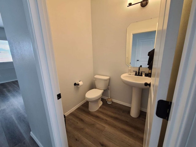 4300 Lauren NE, Rio Rancho, NM 87124 - bathroom featuring toilet and wood finished floors