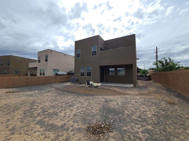 4300 Lauren NE, Rio Rancho, NM 87124 - back of property featuring a patio area and stucco siding