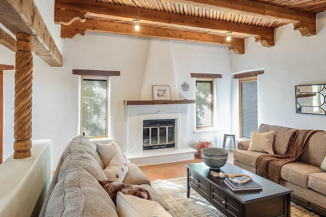 2505 Elfego Rd NW, Albuquerque, NM 87107 - living room with a fireplace and a wood ceiling with exposed beams