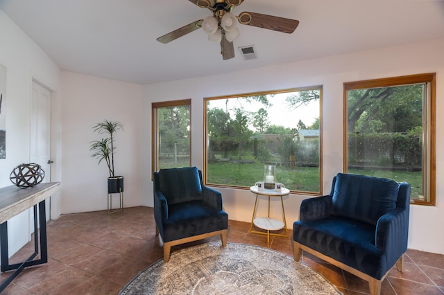 2505 Elfego Rd NW, Albuquerque, NM 87107 - sitting room featuring a ceiling fan and tile patterned flooring
