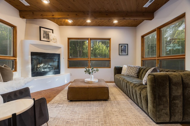 2505 Elfego Rd NW, Albuquerque, NM 87107 - living area featuring a wooden ceiling with exposed beams, a fireplace, and recessed lighting