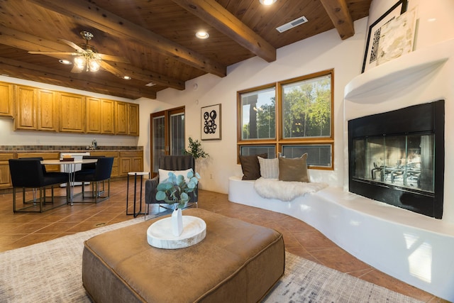 2505 Elfego Rd NW, Albuquerque, NM 87107 - living room featuring tile patterned floors, a wooden ceiling with exposed beams, recessed lighting, and a ceiling fan