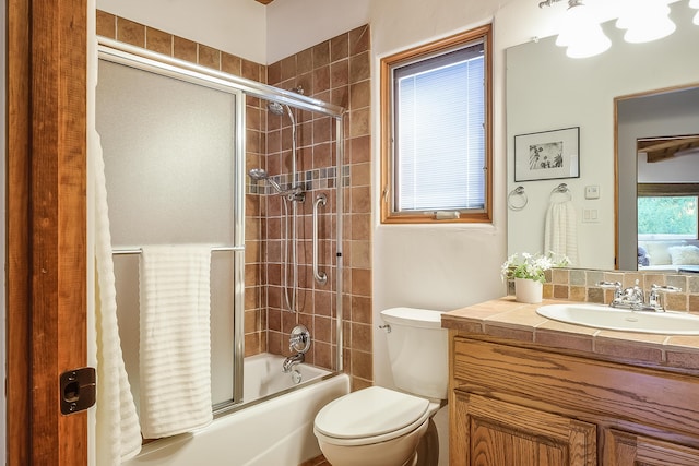 2505 Elfego Rd NW, Albuquerque, NM 87107 - full bathroom with bath / shower combo with glass door and vanity