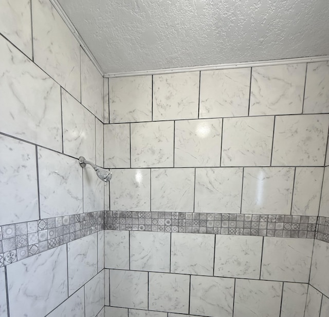 714 Locust St, Clayton, NM 88415 - bathroom view of a textured ceiling and a tile shower