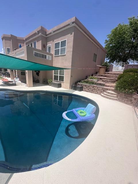 4104 Killington Rd NW, Albuquerque, NM 87114 - outdoor pool with a patio area