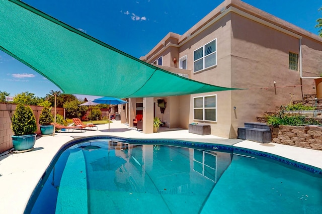 4104 Killington Rd NW, Albuquerque, NM 87114 - view of swimming pool with a patio