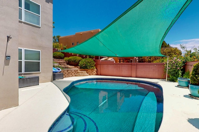 4104 Killington Rd NW, Albuquerque, NM 87114 - view of swimming pool featuring a patio area