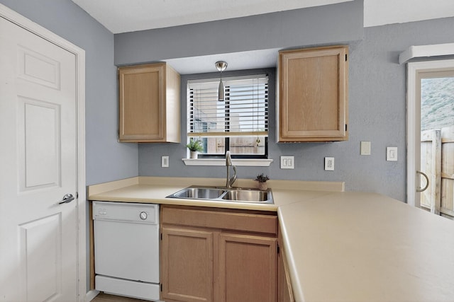 2900 Vista Del Rey NE Unit 7A, Albuquerque, NM 87112 - kitchen with dishwasher, healthy amount of natural light, light countertops, and light brown cabinets