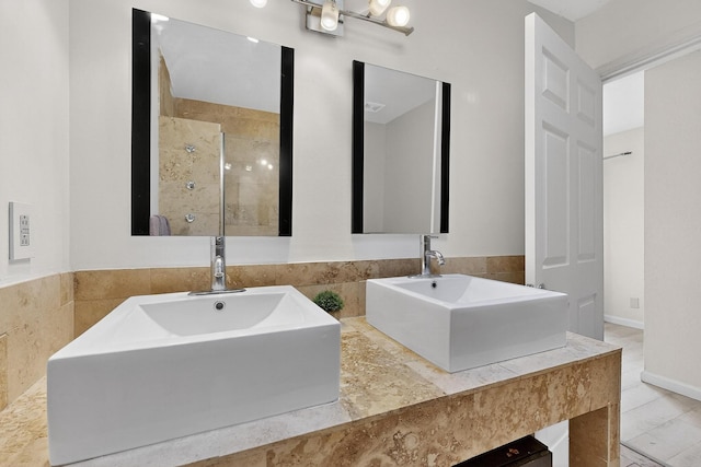2900 Vista Del Rey NE Unit 7A, Albuquerque, NM 87112 - full bathroom with double vanity and a tile shower