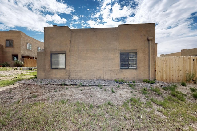 2900 Vista Del Rey NE Unit 7A, Albuquerque, NM 87112 - view of side of home featuring stucco siding