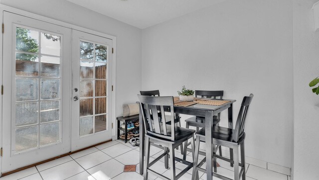 6041 Sequoia Rd NW Unit B3, Albuquerque, NM 87120 - view of exterior entry featuring stucco siding and a patio