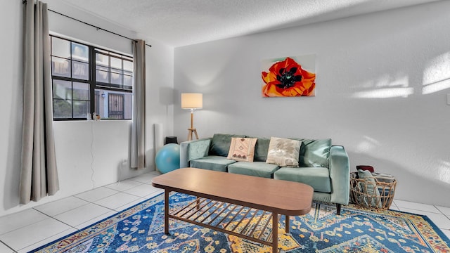 6041 Sequoia Rd NW Unit B3, Albuquerque, NM 87120 - living room featuring tile patterned floors and a textured ceiling