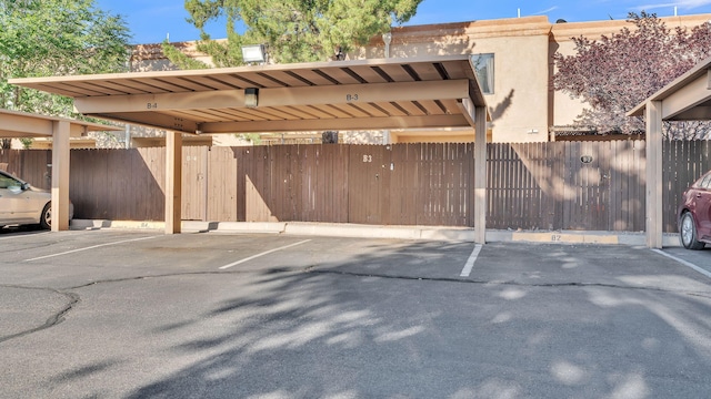 6041 Sequoia Rd NW Unit B3, Albuquerque, NM 87120 - view of covered parking lot