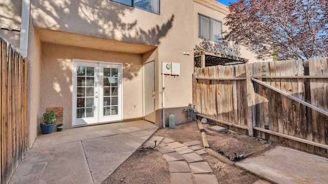 6041 Sequoia Rd NW Unit B3, Albuquerque, NM 87120 - view of patio with french doors