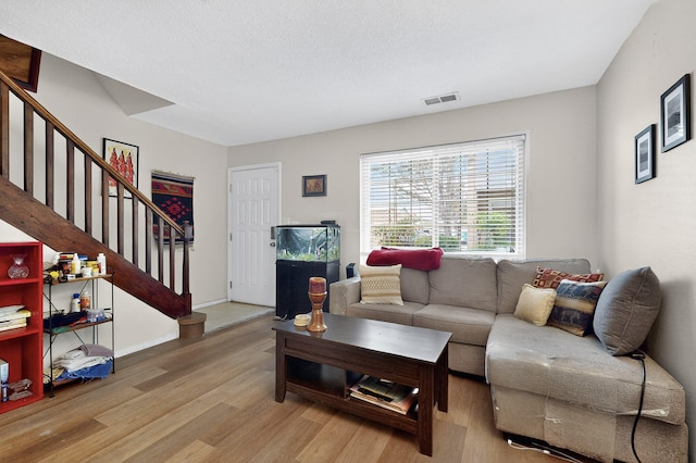 700 Fruit Ave NW Unit G, Albuquerque, NM 87102 - living room with wood finished floors and stairs