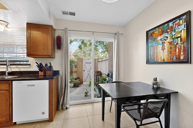 700 Fruit Ave NW Unit G, Albuquerque, NM 87102 - dining area with light tile patterned floors