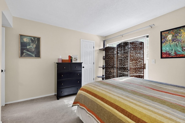 700 Fruit Ave NW Unit G, Albuquerque, NM 87102 - bedroom with carpet floors and baseboards
